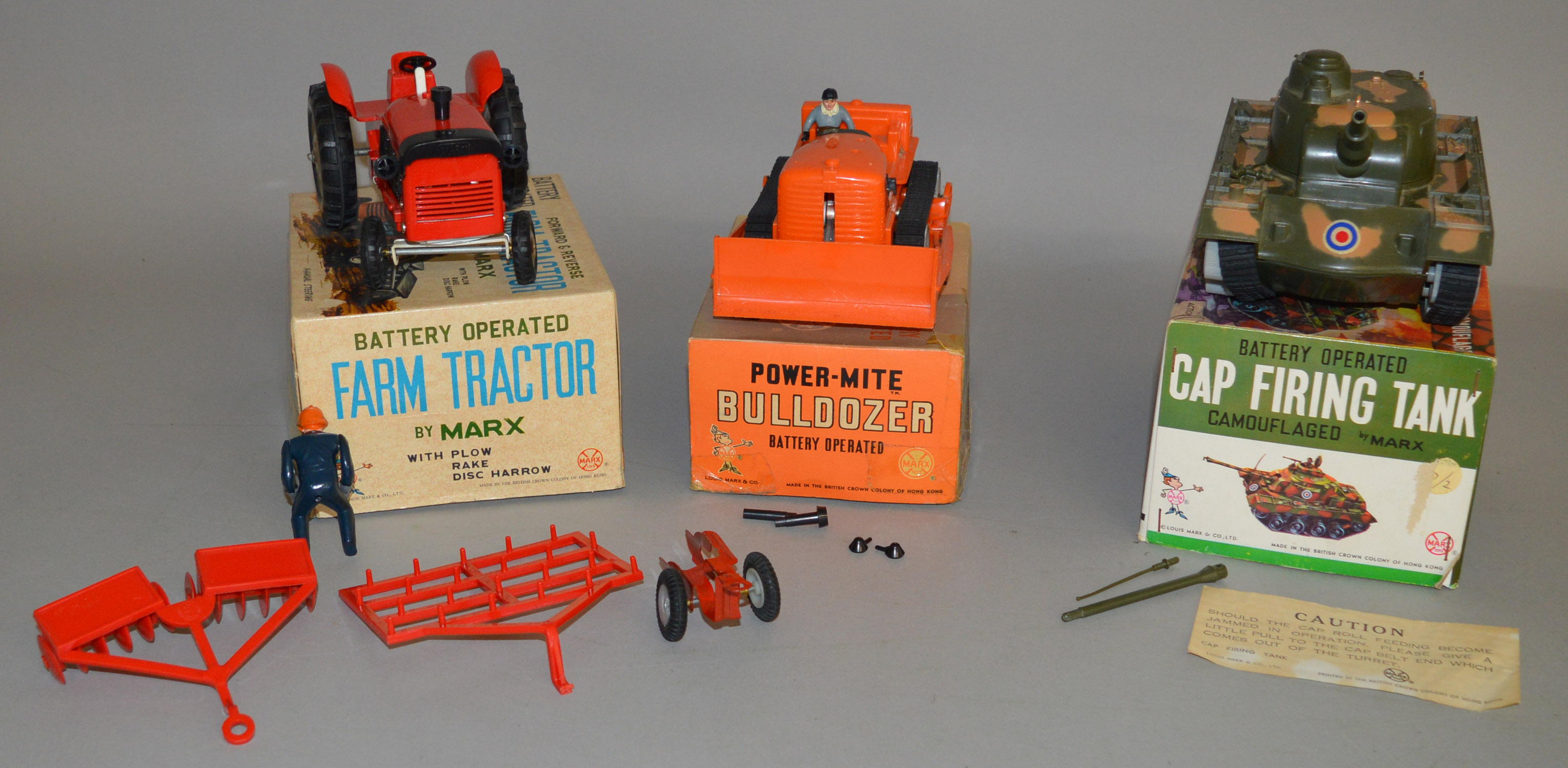 3x Battery operated Marx Toys including Power-Mite Bulldozer, Cap Firing Tank and Farm Tractor, - Image 2 of 3