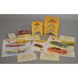 8x Reproduction boxed Dinky Toys models by Atlas Editions together with some related leaflets.