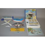 A boxed Minic Ocean Terminal Set together with a quantity of other Minic ship models and plane