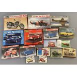 16x Assorted model kits including Revell, Hales, Burago etc, mostly automotive related. all appear