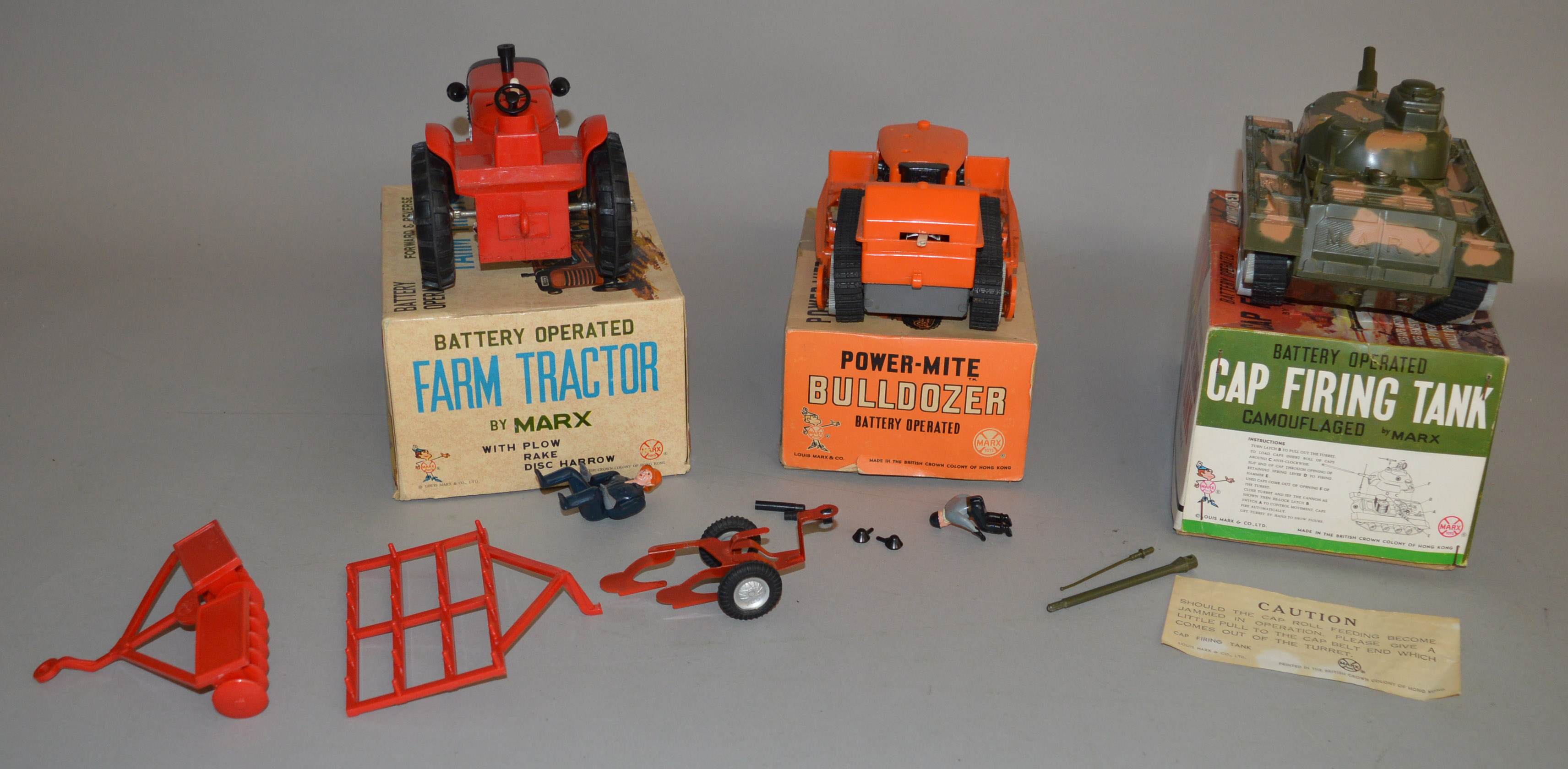 3x Battery operated Marx Toys including Power-Mite Bulldozer, Cap Firing Tank and Farm Tractor, - Image 3 of 3