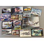 EX DEALER STOCK: 16x Monogram model kits including aviation and automotive examples. All appear