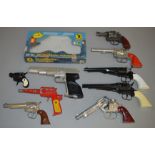 A quantity of toy pistol and revolvers including crescent, streamline etc.