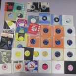 Various 7 inch singles including The Rolling Stones, The Seekers, The Selecter, Sounds Orchestral,