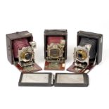 Three Examples of Houghton's 'The Tudor' Folding Plate Cameras.