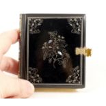 A Rare Bijou Book-Form Double Daguerreotype Case, with Portraits.