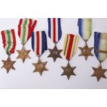 Seven WWII stars to include two Atlantic (one with France & Germany clasp), two France & Germany,