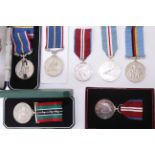 Five post WWII unofficial medals to include two National Service medals one to 'GNR A.LUCAS