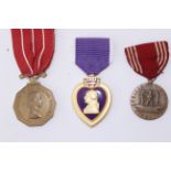 Two American medals to include a Purple Heart & 1941 Army Good Service together with a Canadian