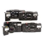 Group of Olympus XA Series Compact Cameras.