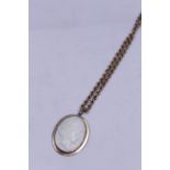 A cameo pendant stamped 9ct suspended by a 9ct H/M rope chain, approx gross weight 7.5gms