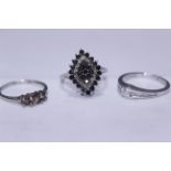 Three 9ct H/M diamond set rings to include a solitaire with diamond set shoulders with Canadian