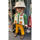 A large Playmobil life size shop display figure of a Saurus team member. Approx 150cm tall.