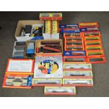 OO Gauge. 38x Assorted Rolling Stock and Coaches including Hornby and Oxford examples, all boxed.