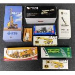 9x Construction vehicle models including National Crane, Grove and RTG examples, all boxed.