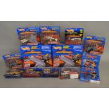 A quantity of Mattel Hotwheels Armageddon sets and Thunderbirds examples, boxed /carded. (13)