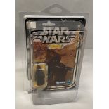 Kenner Star Wars Jawa on 12-back card. Note damage to card in photos. With protective perspex case.
