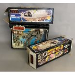 3 boxed Star Wars sets: 2x Rebel Transport and 1x AT-AT.