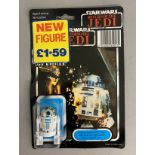 Star Wars Artoo-Detoo (R2-D2) with pop-up Lightsabre on Tri-Logo ROTJ Return Of The Jedi backing car