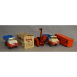 A vintage boxed Tri-Ang Tip lorry together with three unboxed Tri-Ang tinplate vehicles. (4)