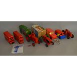 A mixed lot of vintage plastic body toys including a boxed Tri-Ang Minic Tractor and Rosedale