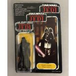 Star Wars Darth Vader figure on Tri-Logo ROTJ Return Of The Jedi backing card. Sealed to card.