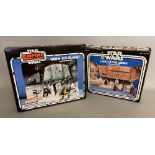2 boxed Kenner Star Wars sets: Hoth Ice Planet Adventure Set and Land Of The Jawas Action Playset.