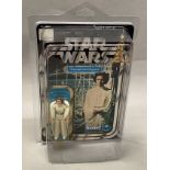 Kenner Star Wars Princess Leia Organa on 12-back card. Note damage to card in photos. With protectiv