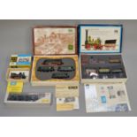 HO Gauge. 2x Piko boxed sets together with a boxed engine and coach (4)