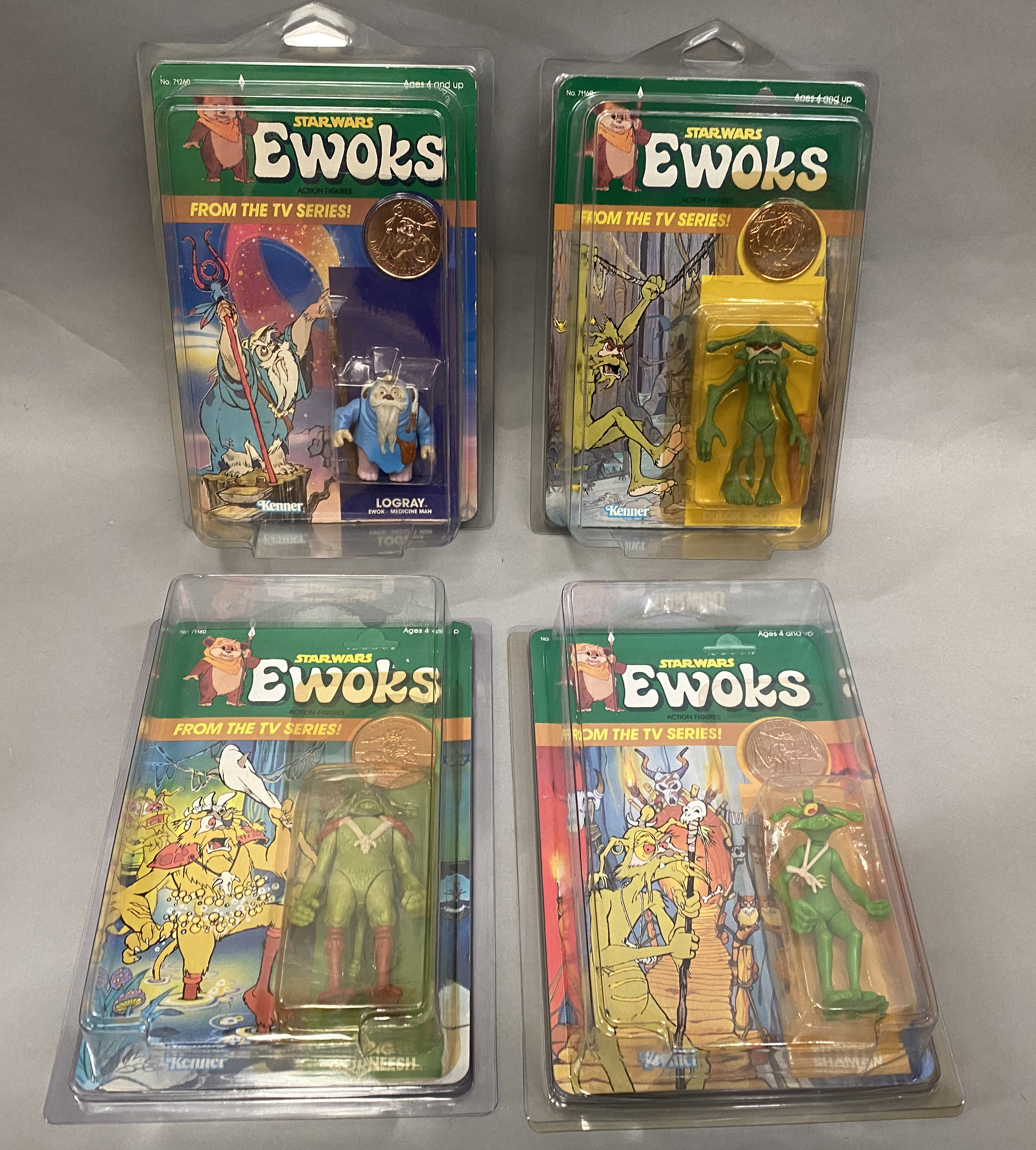 4 vintage Kenner Star Wars figures on Ewok backing cards: Logray, Dulok Scout, King Gorneesh and Sha