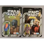 2 Palitoy Star Wars figures: Walrus Man and Snaggletooth. Both sealed on 20-back backing cards.