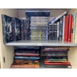 A mixed lot of approx 100 Fantasy related books and comics including Star Wars, Warhammer, Graphic
