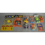 A mixed lot of vintage bagged /carded plastic and similar toys including Niknak toys, Space Robot