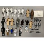 21 vintage Star Wars figures plus some extra weapons.