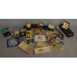 A mixed lot of vintage costume jewellery, medallions, empty jewellery boxes etc.