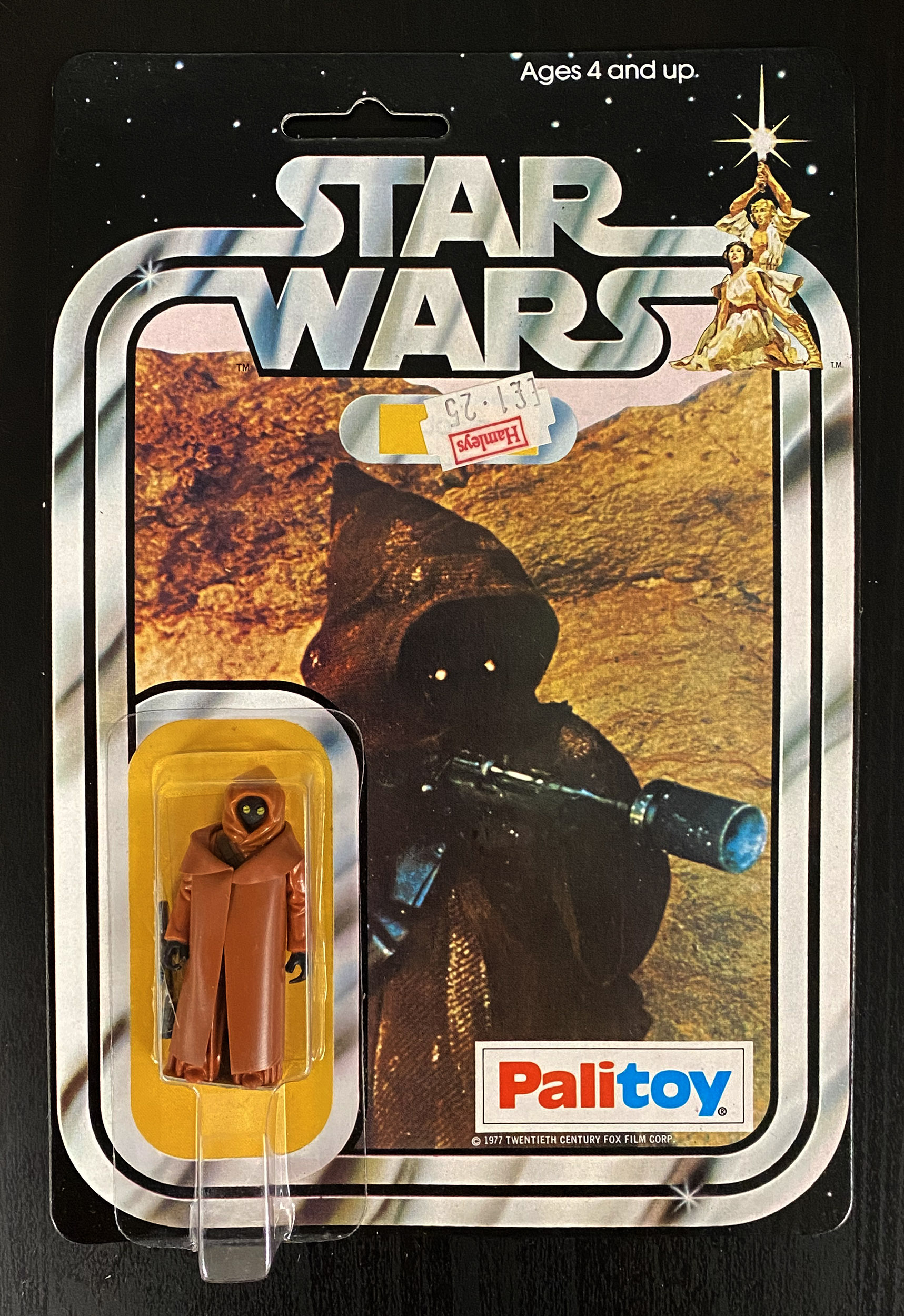 Palitoy Star Wars Jawa with rare Vinyl Cape on 12-back card. One of the rarest carded Star Wars figu