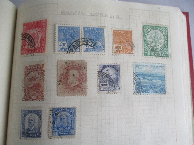 Two albums of various worldwide stamps along with an empty album - Image 24 of 55