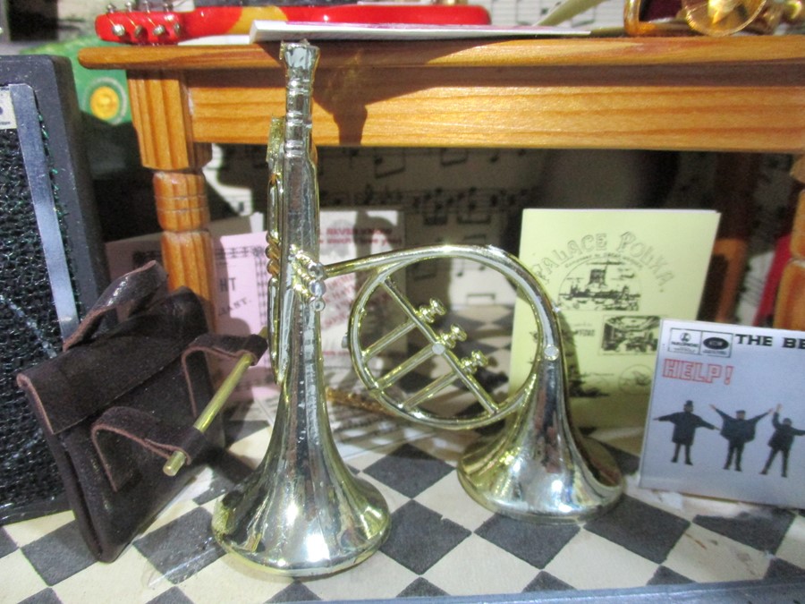 A diorama "Theo's" music shop with wooden building with musical instruments, records, sheet music - Image 8 of 12