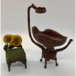 A hand carved miniature dolls house Louis XIV style sunflower chair along with an ornate carved