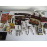 A collection of shaving equipment, clippers, strops, cut throat razors, vintage cigarette boxes etc