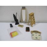 A collection of miniature dolls house kitchen items including an ironing board, step ladder,