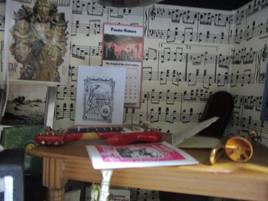 A diorama "Theo's" music shop with wooden building with musical instruments, records, sheet music - Image 6 of 12