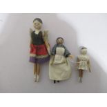 A set of three "peg" dolls, the tallest 17cm