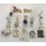 A collection of miniature dolls house china etc. including tea pots, dog, whisk, glasses etc.