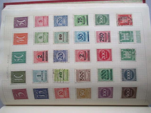 Two albums of various worldwide stamps along with an empty album - Image 34 of 55