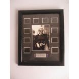 A framed Marilyn Monroe photograph with film cells and certificate of authenticity