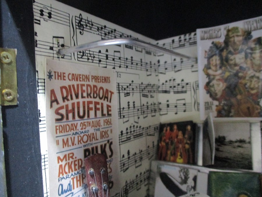 A diorama "Theo's" music shop with wooden building with musical instruments, records, sheet music - Image 5 of 12