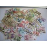 A collection of various world bank notes