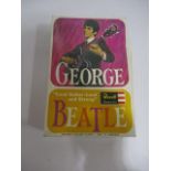 A boxed Revell "The Beatles, George" kit