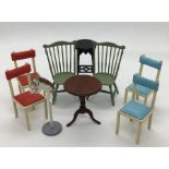A small collection of miniature dolls house furniture, including chairs, torchere, tripod table